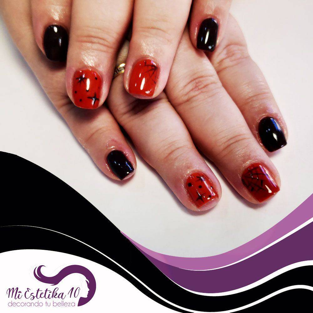 Unas-semipermanentes-halloween-naranjas-y-negras